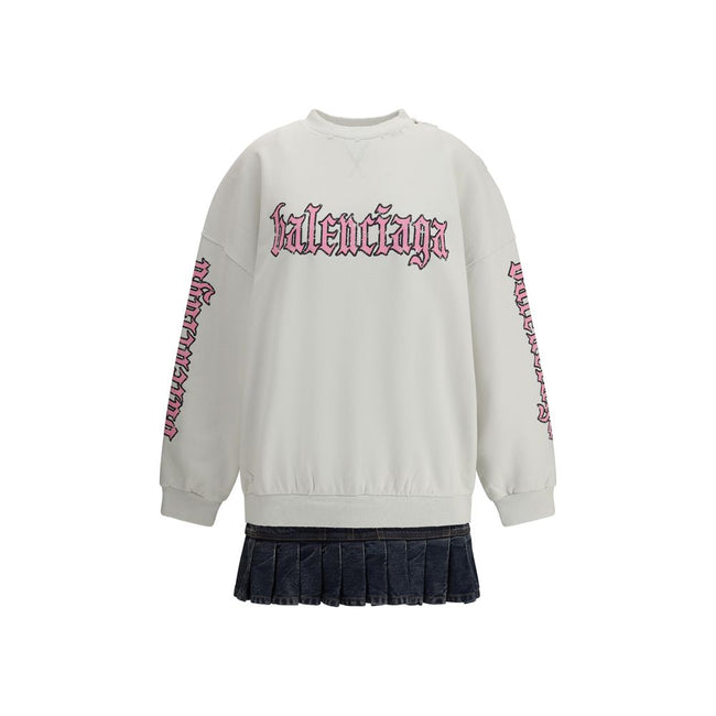 Multicolor Cotton SweatshirtBalenciaga’s Sweatshirt Dress combines comfort and urban style with a distinctive touch. Featuring a contrasting printed logo on the front, it features a ribbed collar and cuffs and dropped shoulders for a relaxed fit. A worn-i