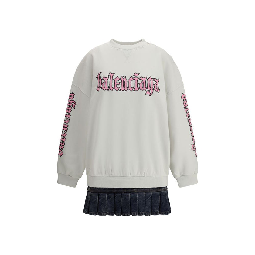 Multicolor Cotton SweatshirtBalenciaga’s Sweatshirt Dress combines comfort and urban style with a distinctive touch. Featuring a contrasting printed logo on the front, it features a ribbed collar and cuffs and dropped shoulders for a relaxed fit. A worn-i