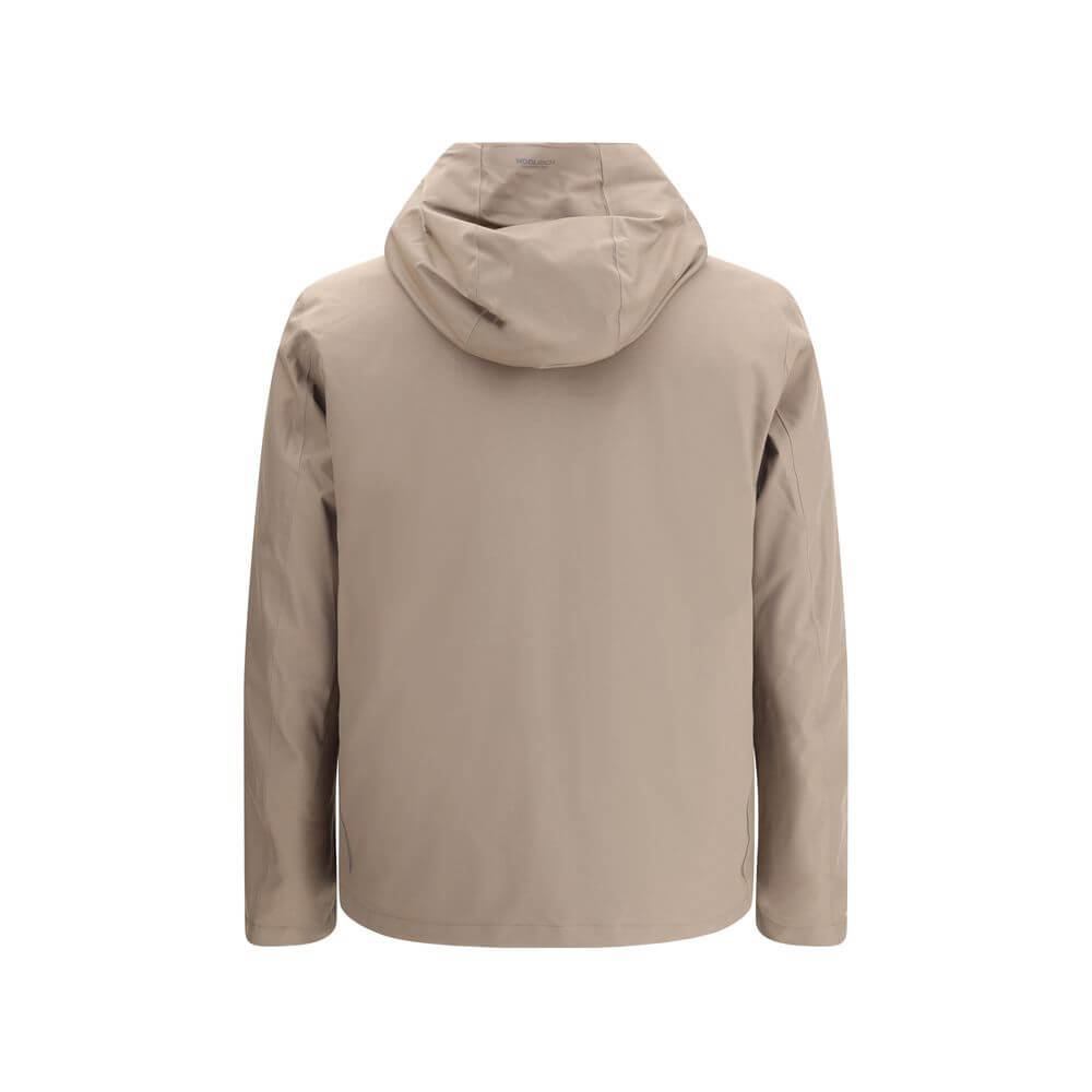 Beige Polyester Shell JacketWoolrich’s Crestmont Jacket combines functionality and versatility in a clean, contemporary design. Featuring an adjustable drawstring hood, it is designed to adapt to different weather conditions thanks to the ability to remov