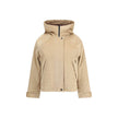 Beige Cotton ClothingWoolrich’s Corduroy Jacket combines comfort and functionality in an outdoor-inspired design. Equipped with a hood, it features a zipper front closure and snaps for added protection. Two buttoned welt side pockets offer practicality, w