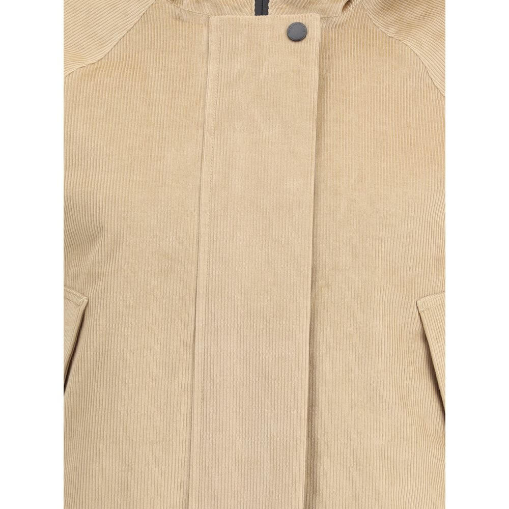 Beige Cotton ClothingWoolrich’s Corduroy Jacket combines comfort and functionality in an outdoor-inspired design. Equipped with a hood, it features a zipper front closure and snaps for added protection. Two buttoned welt side pockets offer practicality, w