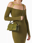 Le Grand Bambino Khaki BagJACQUEMUS Gorgeous brand new, 100% Authentic Jacquemus Le Grand Bambino Khaki Bag. Model: 213BA007-3100-560 Color: Khaki with Gold Hardware Material: Leather Bag with adjustable shoulder strap – Small handle – Removable shoulder
