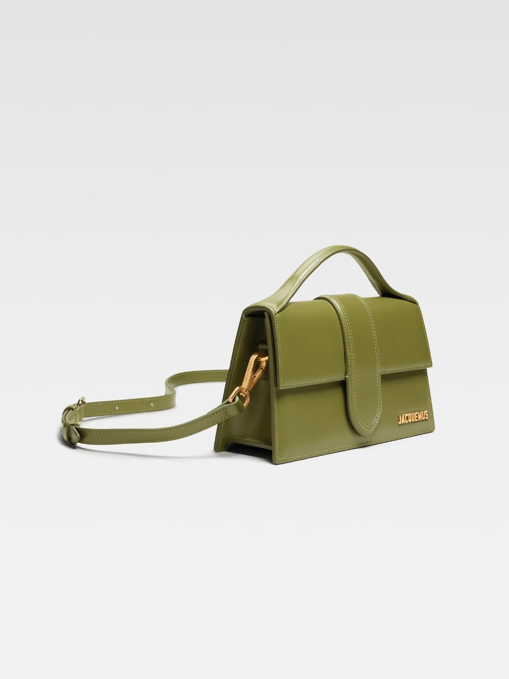 Le Grand Bambino Khaki BagJACQUEMUS Gorgeous brand new, 100% Authentic Jacquemus Le Grand Bambino Khaki Bag. Model: 213BA007-3100-560 Color: Khaki with Gold Hardware Material: Leather Bag with adjustable shoulder strap – Small handle – Removable shoulder