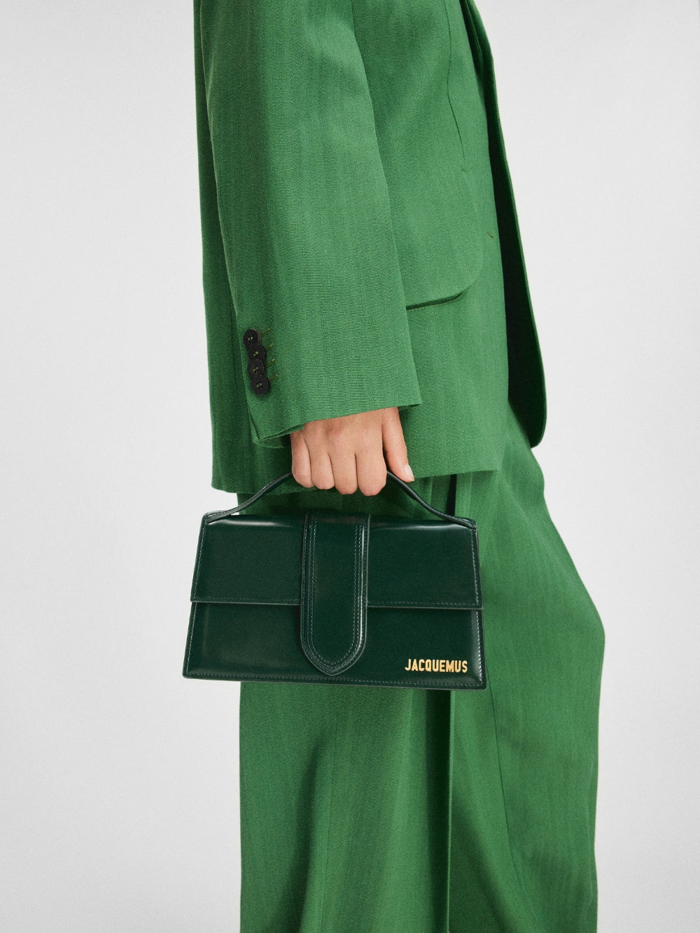 Le Grand Bambino Dark Green BagJACQUEMUS Gorgeous brand new, 100% Authentic Jacquemus Le Grand Bambino Drak Green Bag. Model: 213BA007-3128-590 Color: Dark Green with Gold Hardware Material: Leather Bag with adjustable shoulder strap – Small handle – Remo
