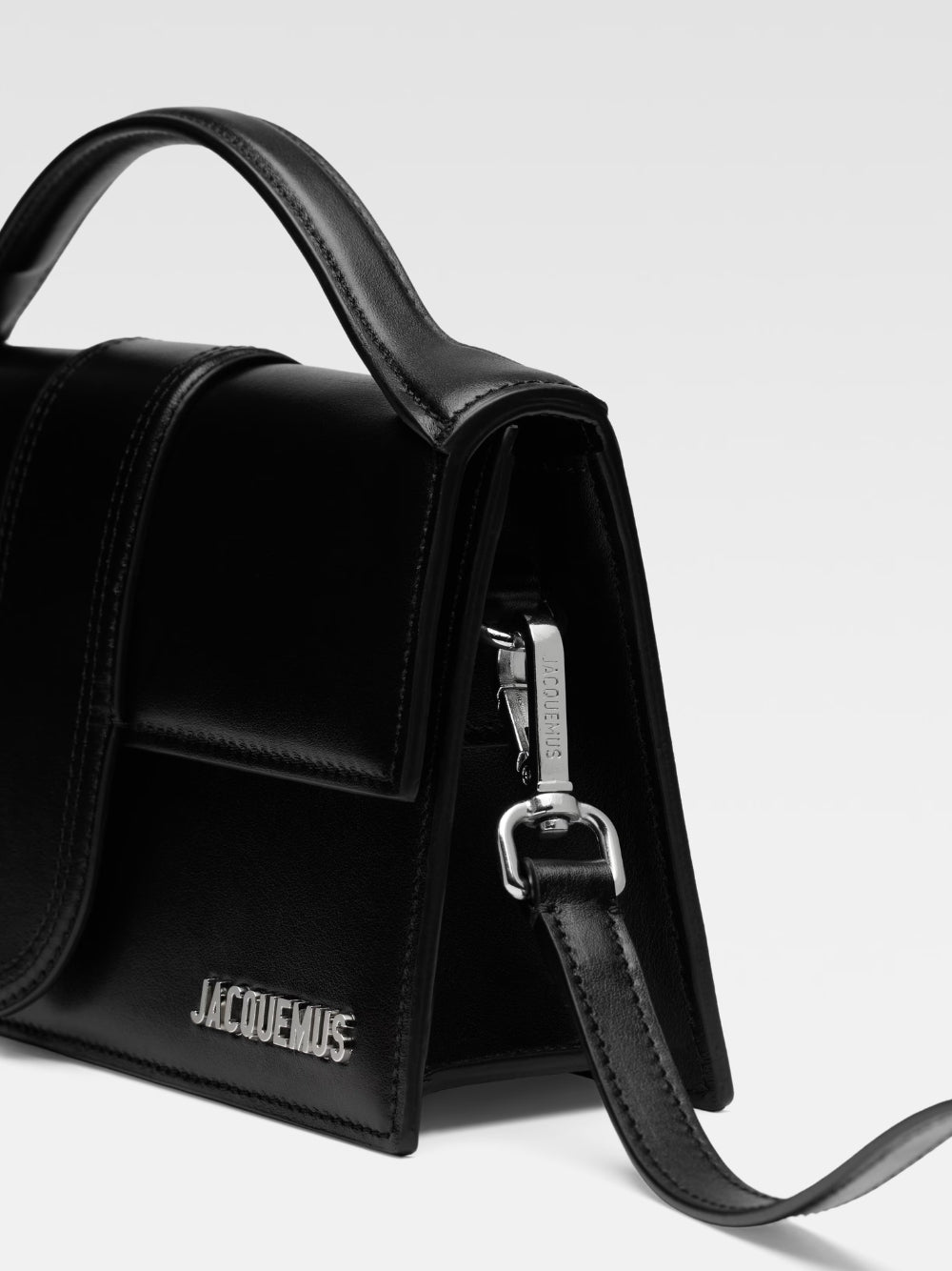 Le Grand Bambino Black BagJACQUEMUS Gorgeous brand new, 100% Authentic Jacquemus Le Grand Bambino Black Bag. Model: 213BA007-3000-99S Color: Black with Silver Hardware Material: Leather Bag with adjustable shoulder strap – Small handle – Removable shoulde