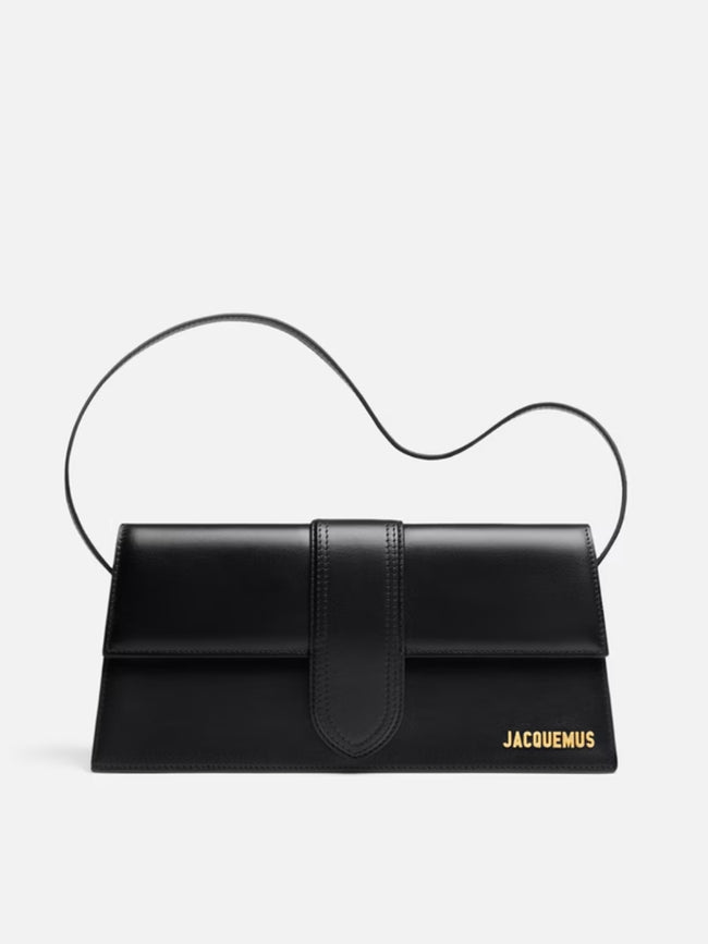 Le Bambino Long Black BagJACQUEMUS Gorgeous brand new, 100% Authentic Jacquemus Le Bambino Long Black Bag Model: 213BA007-3066-390 Color: Black with Gold Hardware – Leather shoulder bag – Magnetic flap closure – Thin, non-adjustable shoulder strap – Insid