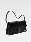 Le Bambino Long Black BagJACQUEMUS Gorgeous brand new, 100% Authentic Jacquemus Le Bambino Long Black Bag Model: 213BA007-3066-390 Color: Black with Gold Hardware – Leather shoulder bag – Magnetic flap closure – Thin, non-adjustable shoulder strap – Insid