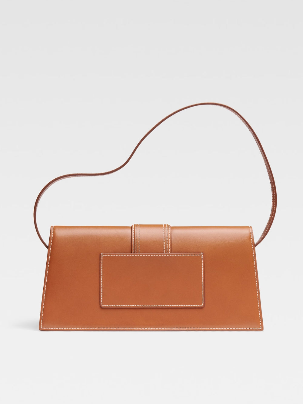 Le Bambino Long Brown BagJACQUEMUS Gorgeous brand new, 100% Authentic Jacquemus Le Bambino Long Brown Bag Model: 221BA013-3072-811 Color: Brown with Gold Hardware – Leather shoulder bag – Magnetic flap closure – Thin, non-adjustable shoulder strap – Insid