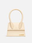 Le Chiquito Moyen Ivory BagJACQUEMUS Gorgeous brand new, 100% Authentic Jacquemus Le Chiquito Moyen Ivory Bag Model: 22E213BA002-3060-120 Color: Ivory with Gold Hardware – Reinforced handle – Magnetic flap closure – Removable long shoulder strap – Inside