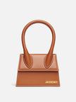 Le Chiquito Moyen Brown BagJACQUEMUS Gorgeous brand new, 100% Authentic Jacquemus Le Chiquito Moyen Brown Bag Model: 22H213BA002-3072-811 Color: Brown with Gold Hardware – Reinforced handle – Magnetic flap closure – Removable long shoulder strap – Inside