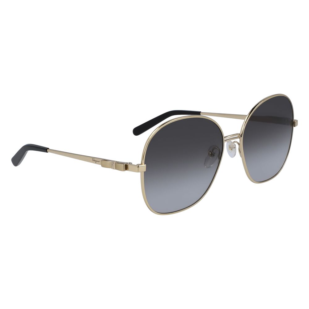 Gold Metal SunglassesSUNGLASSES SALVATORE FERRAGAMO WOMEN SF242S-711 (Lens/Bridge/Temple) 60/16/140 mm.Material: METAL.Colour: Gray Gradient gold.Measures (Lens/Bridge/Temple): 60/16/140mm.Gradient blue.UV filter 2Gold Metal Sunglasses${tagsSalvatore Ferr