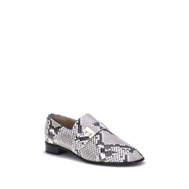 Multicolor Goatskin Slip-On LoafersFerragamo’s python print leather Loafers are an elegant expression of style and personality. Featuring a squared toe and a block heel that ensures stability and comfort, they stand out for the refined golden metal detail