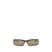 Brown Acetate SunglassesBalenciaga’s Sunset Sunglasses combine contemporary design and sustainability. Made of acetate, they are embellished with metallic logo details on the temples, adding a touch of distinctive elegance. The rectangular shape gives a m