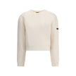White Wool SweatshirtBalenciaga’s virgin wool Sweater is an essential piece that combines comfort and contemporary style. Made from fine virgin wool, it offers a soft and warm feel against the skin. The design includes a classic crew neck, dropped shoulde