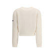 White Wool SweatshirtBalenciaga’s virgin wool Sweater is an essential piece that combines comfort and contemporary style. Made from fine virgin wool, it offers a soft and warm feel against the skin. The design includes a classic crew neck, dropped shoulde
