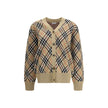 Brown Wool CardiganWool Cardigan by Burberry, embellished with the timeless Archivio Check pattern. The model features a V-neckline on the front, button closure and two side welt pockets. Ribbed cuffs and hem complete the design, ensuring comfort and a de