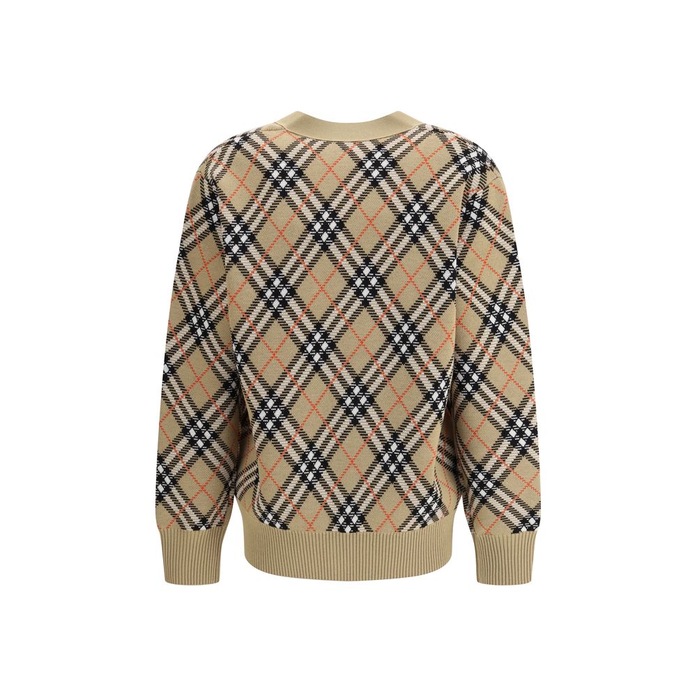 Brown Wool CardiganWool Cardigan by Burberry, embellished with the timeless Archivio Check pattern. The model features a V-neckline on the front, button closure and two side welt pockets. Ribbed cuffs and hem complete the design, ensuring comfort and a de