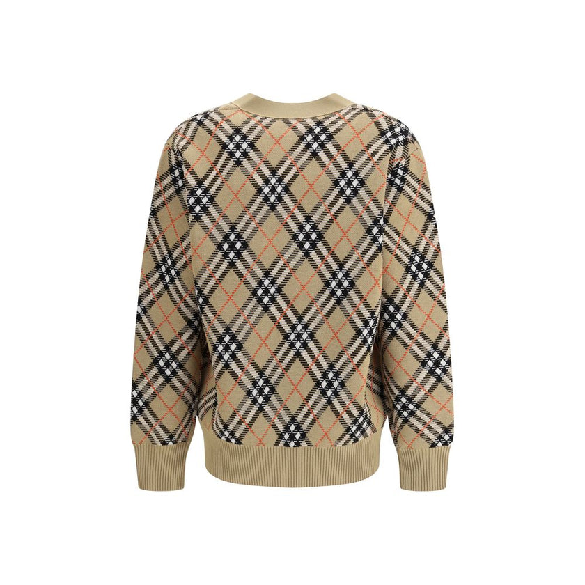 Brown Wool CardiganWool Cardigan by Burberry, embellished with the timeless Archivio Check pattern. The model features a V-neckline on the front, button closure and two side welt pockets. Ribbed cuffs and hem complete the design, ensuring comfort and a de