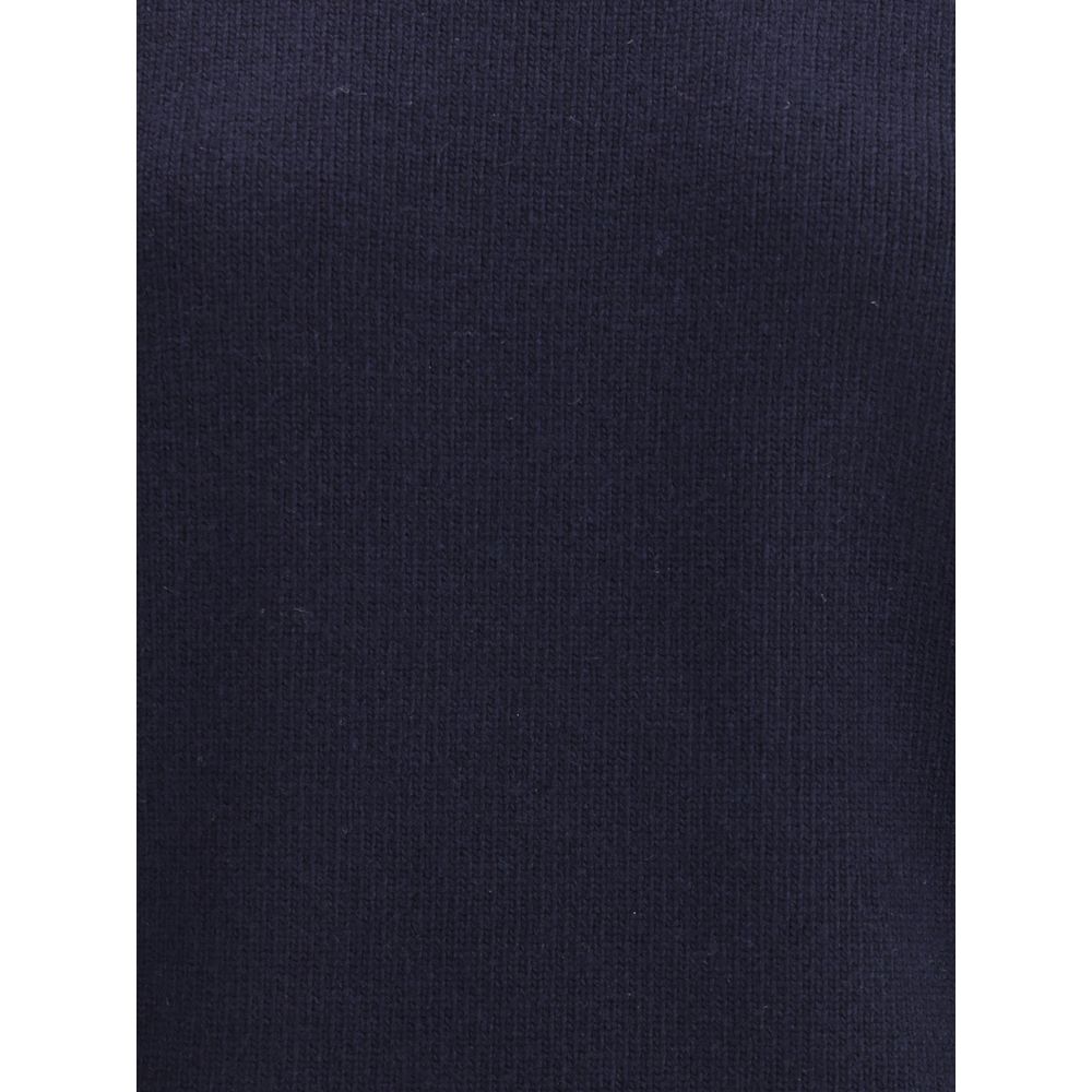 Blue Wool SweatshirtChloé’s Sweater is a luxurious and comfortable garment ideal for a sophisticated and relaxed look. Made from a fine wool and cashmere knit, it features an oversized design that amplifies its softness and snug fit. The crew neck, cuffs