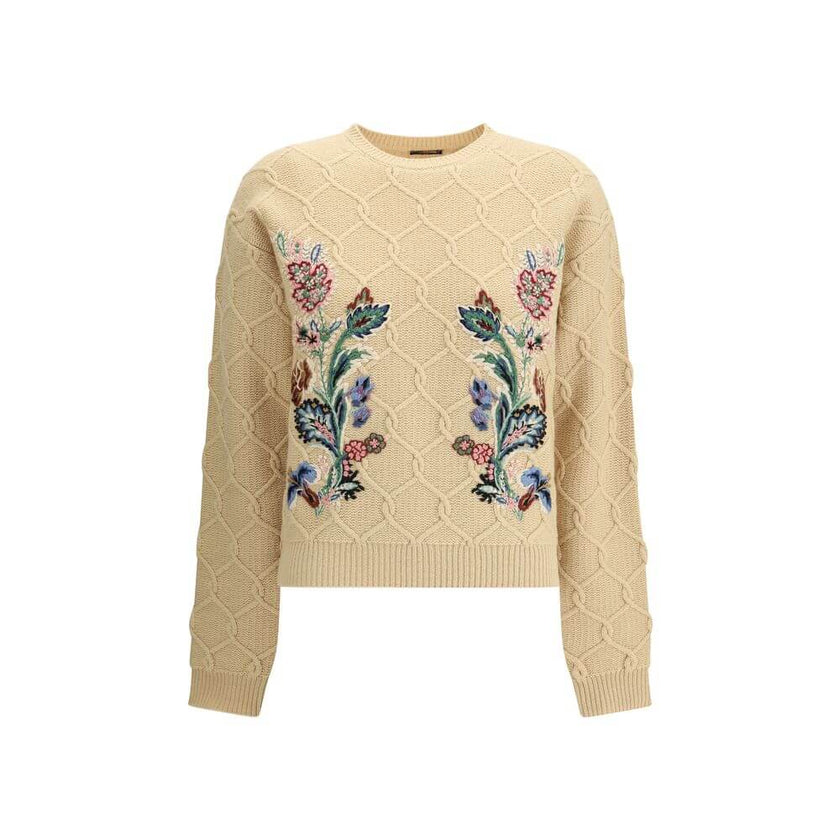 Beige Wool SweatshirtThe Etro Sweater combines comfort and sophistication with a distinctive touch. Crafted with a ribbed crew neck, hem and cuffs, it features a classic structure enhanced by floral embroidery sewn onto the front, which gives the garment