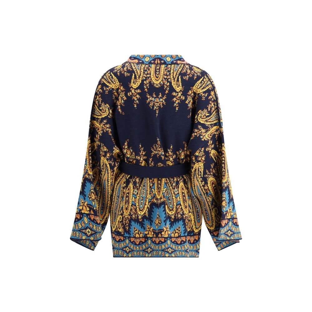Multicolor Cotton CardiganThe Etro multicoloured Cardigan is a lively and enveloping piece, characterised by a richly coloured pattern that expresses the eclectic style of the brand. Equipped with two practical patch pockets on the front, it is completed