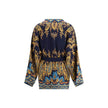 Multicolor Cotton CardiganThe Etro multicoloured Cardigan is a lively and enveloping piece, characterised by a richly coloured pattern that expresses the eclectic style of the brand. Equipped with two practical patch pockets on the front, it is completed