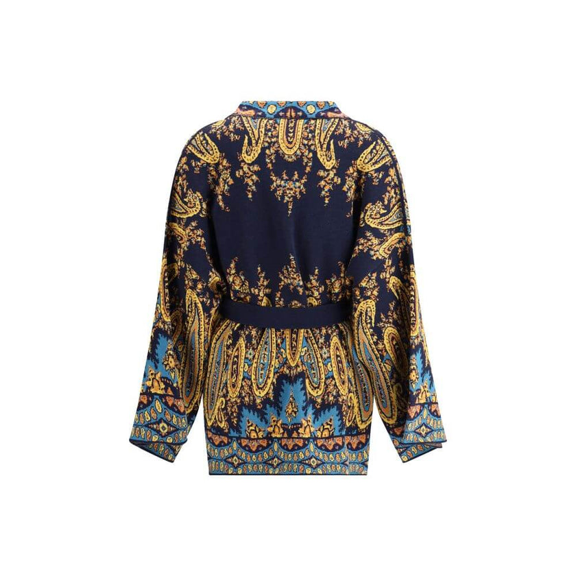 Multicolor Cotton CardiganThe Etro multicoloured Cardigan is a lively and enveloping piece, characterised by a richly coloured pattern that expresses the eclectic style of the brand. Equipped with two practical patch pockets on the front, it is completed