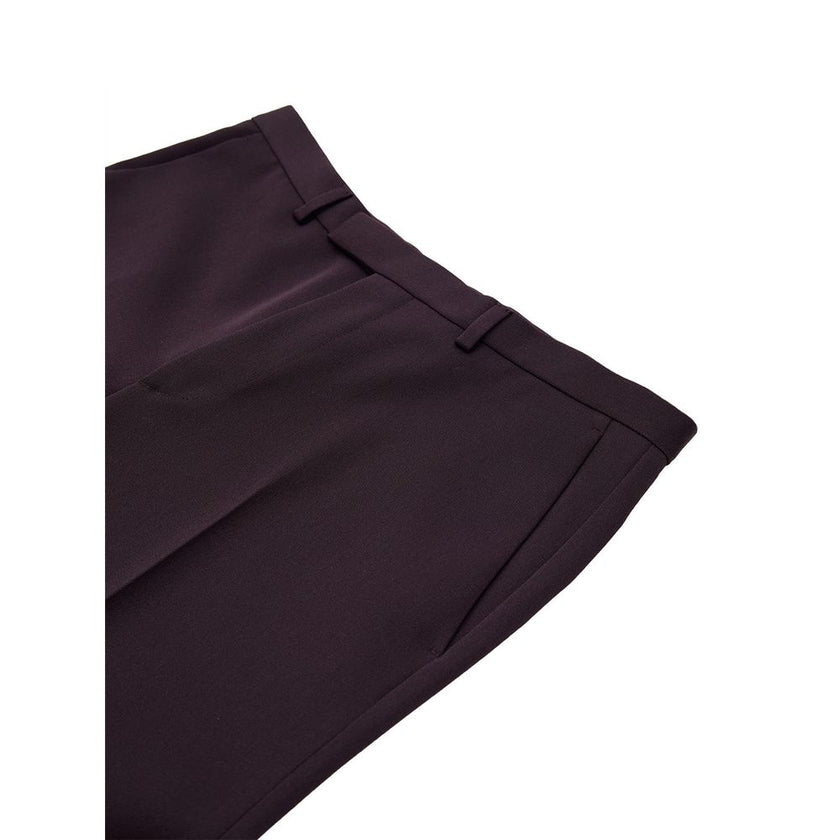 Bordeaux Wool Dress PantsBordeaux Tailored Trousers with Gucci Logo Embroidery. In dark burgundy, opening with hook and covered zip, two side welt pockets, two back pockets. Tone-on-tone embroidered logo above back pocket, straight leg. Composition: 100%