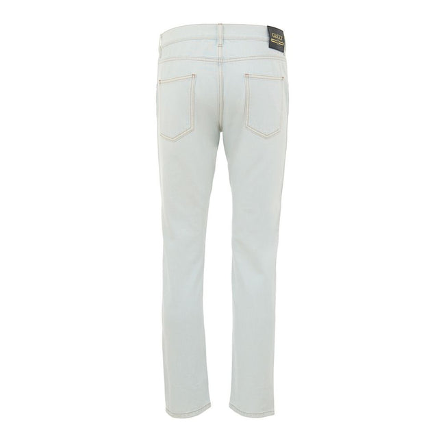Blue Cotton Relaxed Fit JeansJeans Denim Chiaro Relaxed Fit Gucci. In light blue denim, no stretch, front opening with buttons, five pockets, on the back leather tag with gold contrasting logo. Composition: 100% Cotton Internal SKU: 25GIU172 Brand SKU: 40