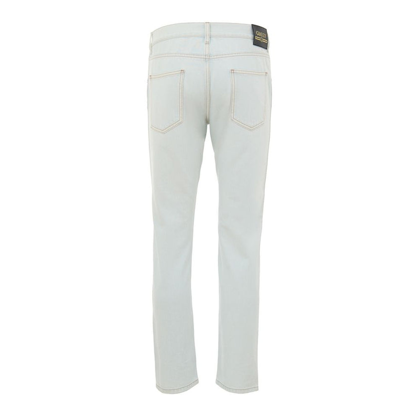 Blue Cotton Relaxed Fit JeansJeans Denim Chiaro Relaxed Fit Gucci. In light blue denim, no stretch, front opening with buttons, five pockets, on the back leather tag with gold contrasting logo. Composition: 100% Cotton Internal SKU: 25GIU172 Brand SKU: 40