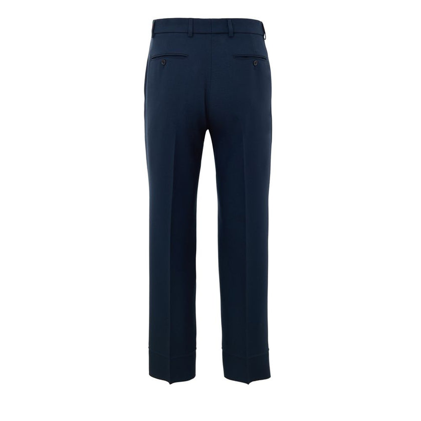 Blue Cotton Casual PantsBlue Tailored Trousers with Gucci Web Tape Detail. Opening with hook and covered zip, two side welt pockets, two back pockets closed with button, straight leg ankle length. At the waist web tape detail applied in green and red. Com
