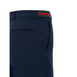 Blue Cotton Casual PantsBlue Tailored Trousers with Gucci Web Tape Detail. Opening with hook and covered zip, two side welt pockets, two back pockets closed with button, straight leg ankle length. At the waist web tape detail applied in green and red. Com