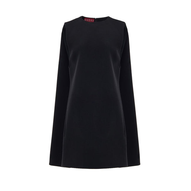 Black Wool Casual DressGucci Short Sleeveless Bell Dress. In black wool, two side welt pockets, hidden zip opening at the back. 60s-inspired model with round neckline and fabric pleat stitching on the sides. Tone-on-tone logo embroidery on the bottom. Com