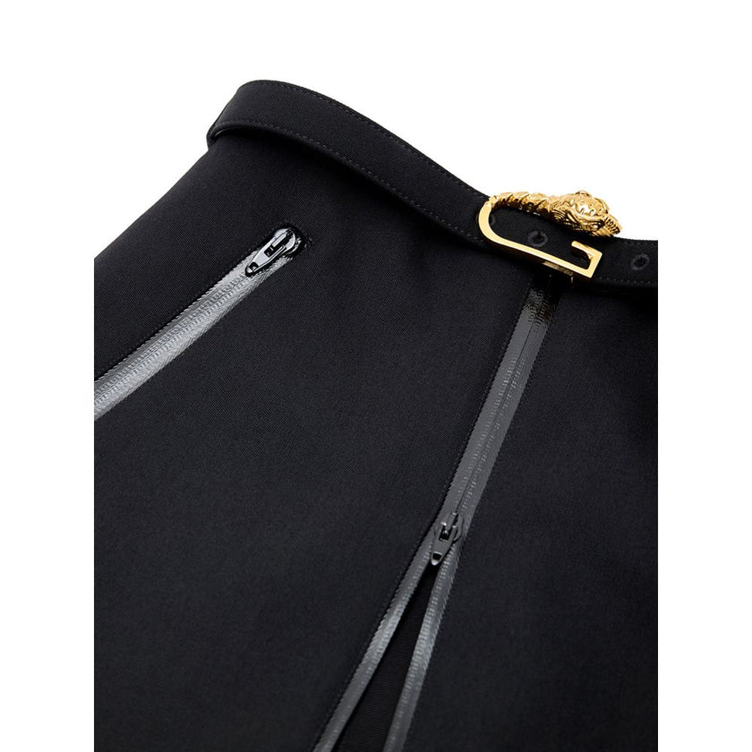 Black Wool Midi SkirtBlack Skirt with Zip and Gucci Belt. Removable fabric belt with gold logo buckle at the waist. Long central zip with latex detail, two pockets on the sides with visible zip. Medium length model, slightly flared, stretch fabric. Compos