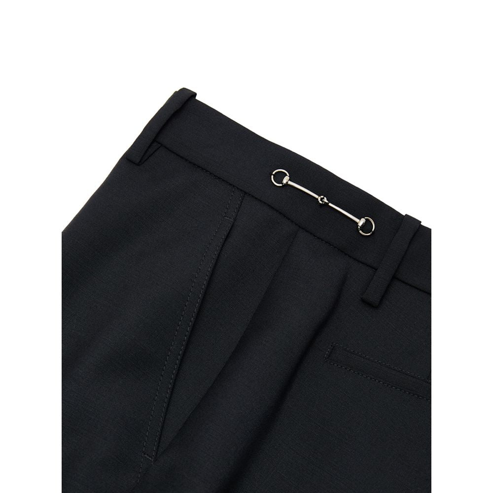 Black Wool Dress PantsBlack Tailored Trousers with Gucci Metallic Detail. In black, straight fit, front fastening with hook and covered zip, two side welt pockets, two back pockets, straight leg and two internal slits on the bottom. On the sides at the wa