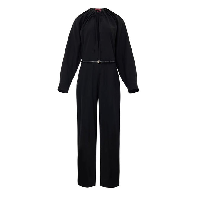 Black Wool JumpsuitBlack Tracksuit Dress with Gucci Belt. Crewneck, wide neckline adjustable with lace, long sleeves closed with button. Removable thin patent leather belt with GG logo at the waist. Wide leg. Composition: 96% Wool, 4% Elastane Internal SK