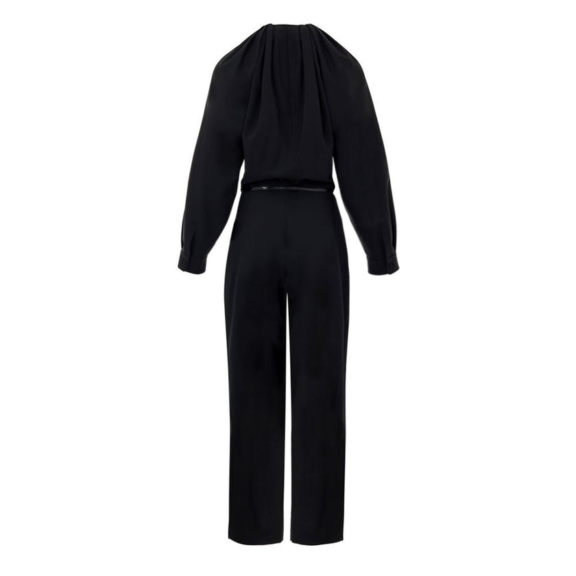 Black Wool JumpsuitBlack Tracksuit Dress with Gucci Belt. Crewneck, wide neckline adjustable with lace, long sleeves closed with button. Removable thin patent leather belt with GG logo at the waist. Wide leg. Composition: 96% Wool, 4% Elastane Internal SK