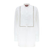 White Cotton BlouseWhite Cotton Poplin Blouse with Gucci Crystal Decorations. Front fastening with tone-on-tone fabric-covered buttons, round neckline, piqué panel, edge with crystal and bead details, rounded at the bottom Composition: 100% Cotton Interna