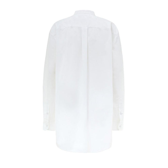 White Cotton BlouseWhite Cotton Poplin Blouse with Gucci Crystal Decorations. Front fastening with tone-on-tone fabric-covered buttons, round neckline, piqué panel, edge with crystal and bead details, rounded at the bottom Composition: 100% Cotton Interna
