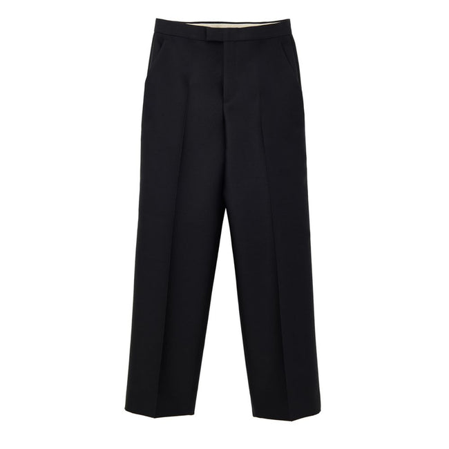 Black Cotton Casual PantsBlack Tailored Trousers in Gucci Technical Fabric. Opening with hook and covered zip, two side welt pockets, two back pockets, straight and wide leg with cropped cut. Composition: 84% Wool, 16% Silk Internal SKU: 25GIU177 Brand SK