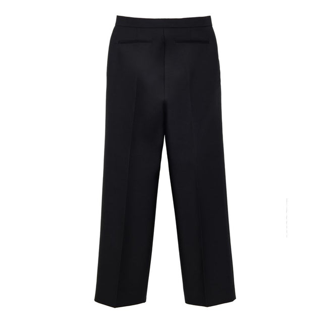 Black Cotton Casual PantsBlack Tailored Trousers in Gucci Technical Fabric. Opening with hook and covered zip, two side welt pockets, two back pockets, straight and wide leg with cropped cut. Composition: 84% Wool, 16% Silk Internal SKU: 25GIU177 Brand SK