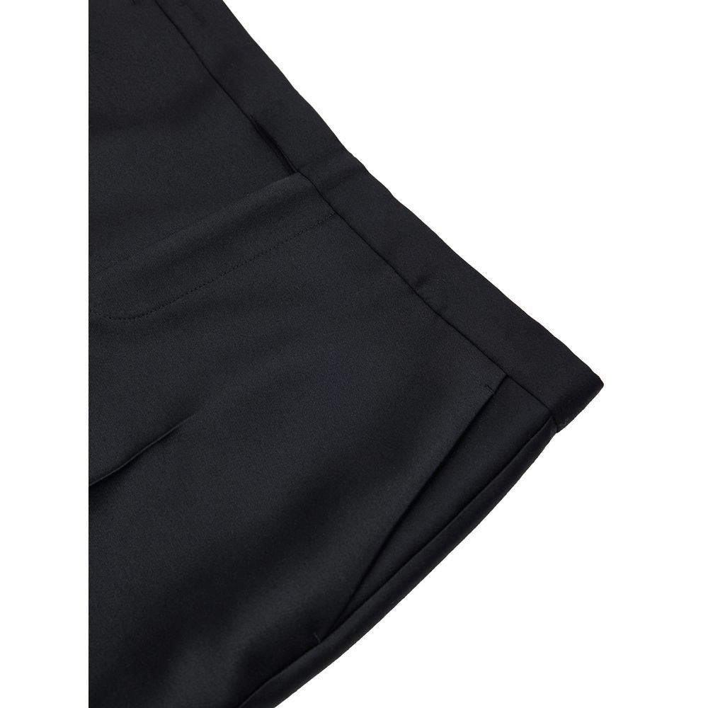 Black Cotton Casual PantsBlack Tailored Trousers in Gucci Technical Fabric. Opening with hook and covered zip, two side welt pockets, two back pockets, straight and wide leg with cropped cut. Composition: 84% Wool, 16% Silk Internal SKU: 25GIU177 Brand SK