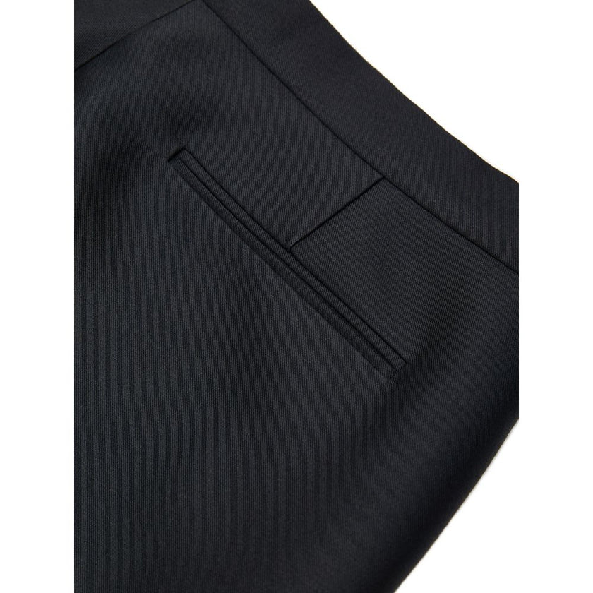 Black Cotton Casual PantsBlack Tailored Trousers in Gucci Technical Fabric. Opening with hook and covered zip, two side welt pockets, two back pockets, straight and wide leg with cropped cut. Composition: 84% Wool, 16% Silk Internal SKU: 25GIU177 Brand SK