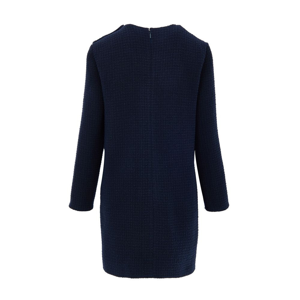 Navy Blue Wool Short DressBlue Bouclé Dress with Gucci Logo Buttons. Mid-length dress, round neckline, long sleeves, two side welt pockets, opening on the shoulder with gold Gucci logo buttons. Straight tube line, internal lining Composition: 84% Wool 16%