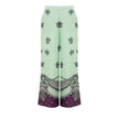 Green Silk Casual PantsGucci Print Silk Palazzo Pants. In aqua green and purple, with contrasting polka dots and flower print. Side zip opening, no button, two side welt pockets, wide leg. Composition: 100% Silk Internal SKU: 25GIU171 Brand SKU: 744909ZAP
