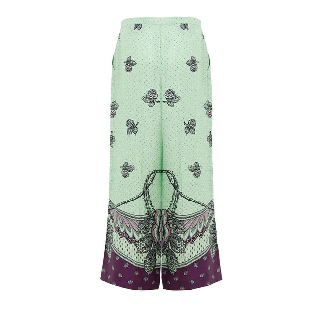 Green Silk Casual PantsGucci Print Silk Palazzo Pants. In aqua green and purple, with contrasting polka dots and flower print. Side zip opening, no button, two side welt pockets, wide leg. Composition: 100% Silk Internal SKU: 25GIU171 Brand SKU: 744909ZAP