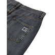 Gray Cotton Relaxed Fit JeansGucci Regular Fit Dark Denim Pants. In dark gray washed denim, button opening, five pockets, regular fit. On the back pocket Gucci logo in crystals Composition: 100% Cotton Internal SKU: 25GIU174 Brand SKU: 760028XDCPE1026Gray
