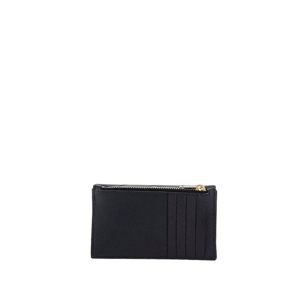 Black Calf Leather Bos Taurus WalletLeather Card Holder by Saint Laurent is a compact and sophisticated accessory designed for those seeking style and functionality in one. The front snap-button closure provides practicality and security, while the embroi