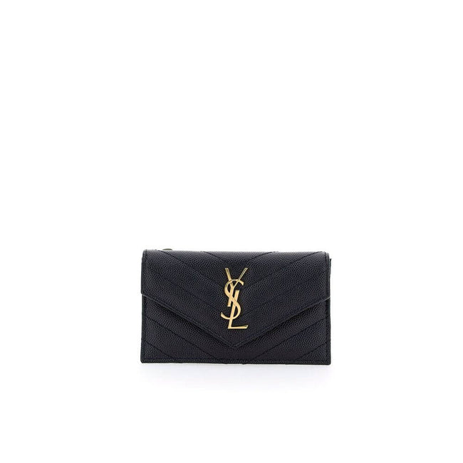 Black Calf Leather Bos Taurus WalletLeather Card Holder by Saint Laurent is a compact and sophisticated accessory designed for those seeking style and functionality in one. The front snap-button closure provides practicality and security, while the embroi
