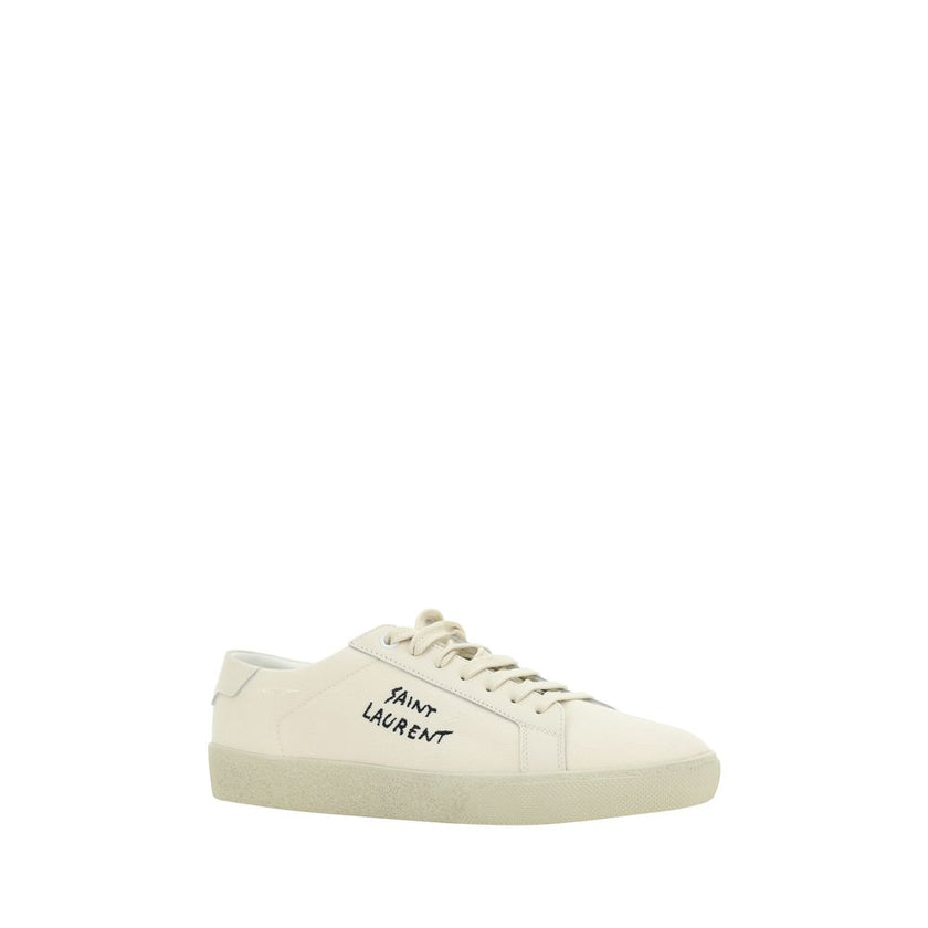 White Rubber Low Top SneakersCotton Sneakers by Saint Laurent, round toe, lace-up front closure, crater-effect flat sole, iconic brand signature embroidered in contrast on outer side panel. Season: AW25 Composition: SOLE 100% Rubber UPPER 100% Cotton MADE